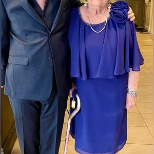 A boutique chiffon dress.  Extremely elegant.  Size 12 petite.